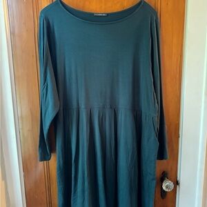 Dark green/teal dress.